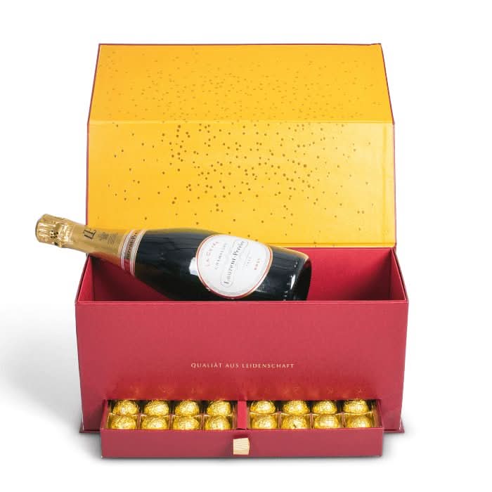 Rote Geschenkbox mit Laurent - Perrier Brut und Pralinen -