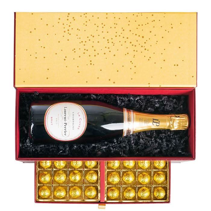 Rote Geschenkbox mit Laurent - Perrier Brut und Pralinen -
