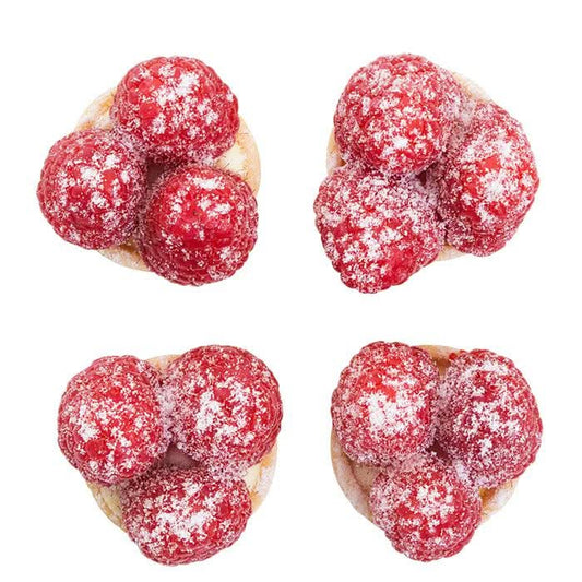 Hausgemachte Fours mit Himbeeren und Vanillecreme